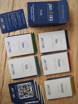 Catholic Prayer Cards — Pax & Ora family prayer pack with 60 prompt cards in a blue tuck box on a wooden surface.