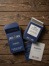 Catholic Prayer Cards — Pax & Ora Imaginative Prayer Pack with navy blue tuck box and cards on rustic wood surface.
