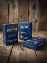 Catholic Prayer Cards — Pax & Ora Seasons of Grace deck in navy blue tuck boxes on a rustic wooden surface.
