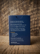 Catholic Prayer Cards — Pax & Ora Imaginative Prayer Pack box back with text on a rustic wooden background.